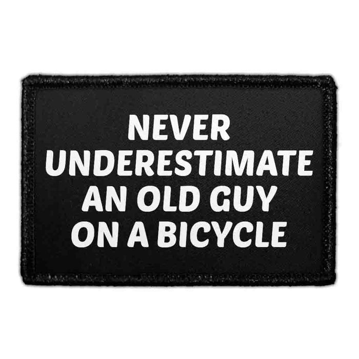 Never Underestimate An Old Guy On A Bicycle. - Removable Patch - Pull Patch - Removable Patches That Stick To Your Gear